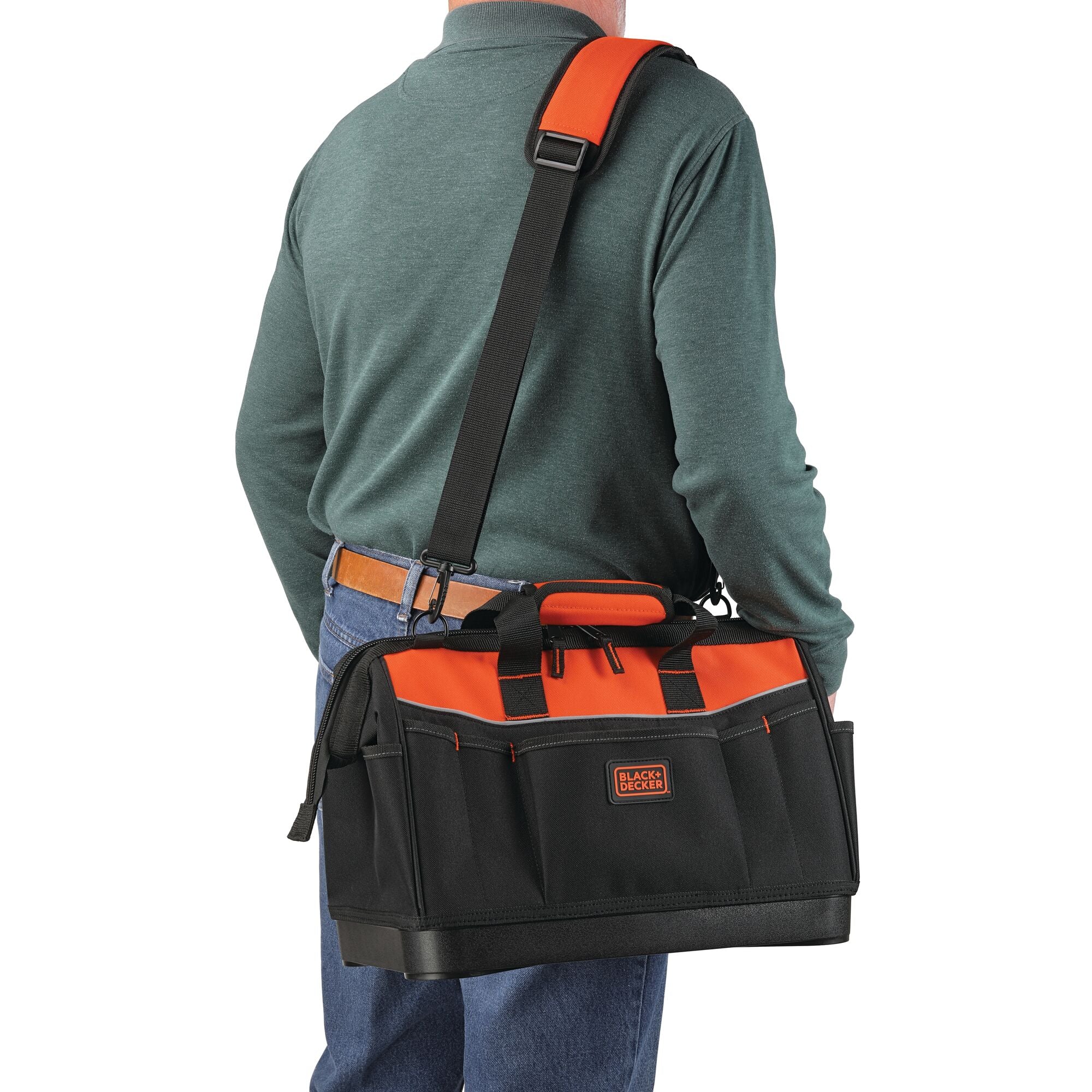 16 inch tool bag being carried by a person.