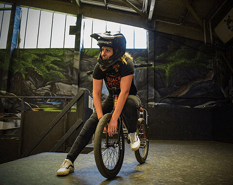 BMXer Nikita Ducarroz sitting on her bike