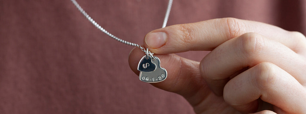 Double silver heart necklace with initial and date
