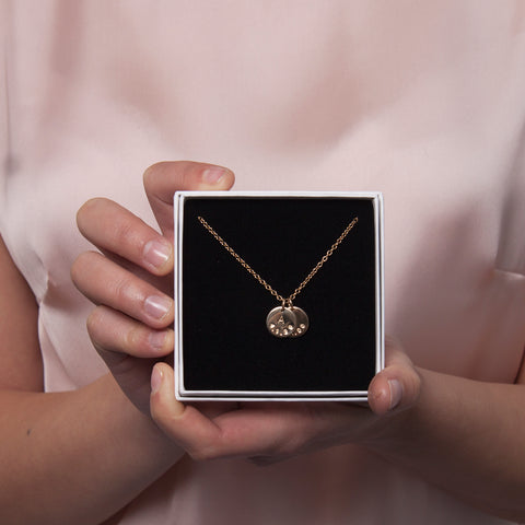 gold date and initial necklace 