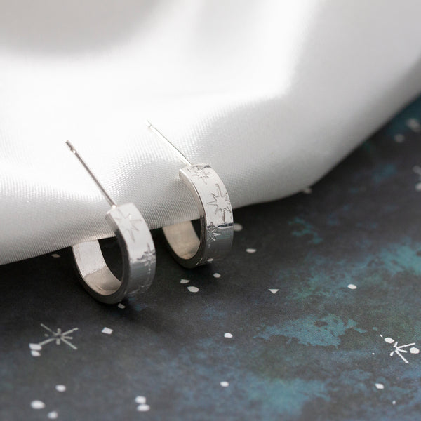 Sterling silver starry hoop earrings