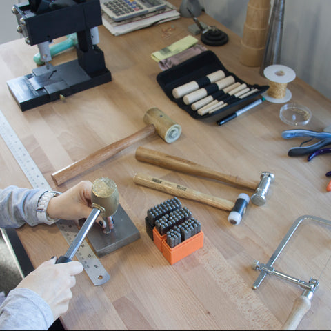 Hand stamping jewellery in the lulu and belle studio 