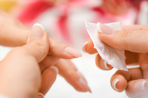 Nail being prepped with a lint free wipe