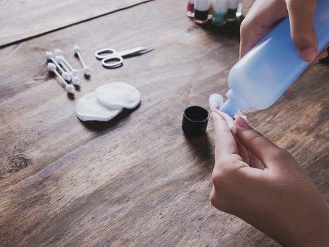 Acetone being applied to cotton pad