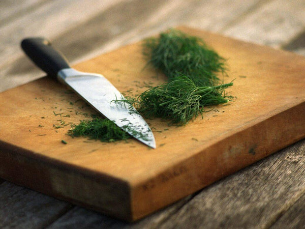 Image of dill weed on chopping board | Dill Weed Shortage | High Quality Organics