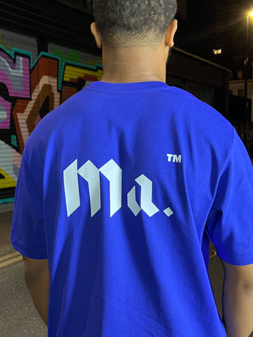 Back of a Cobalt blue T-shirt with the More amoure logo