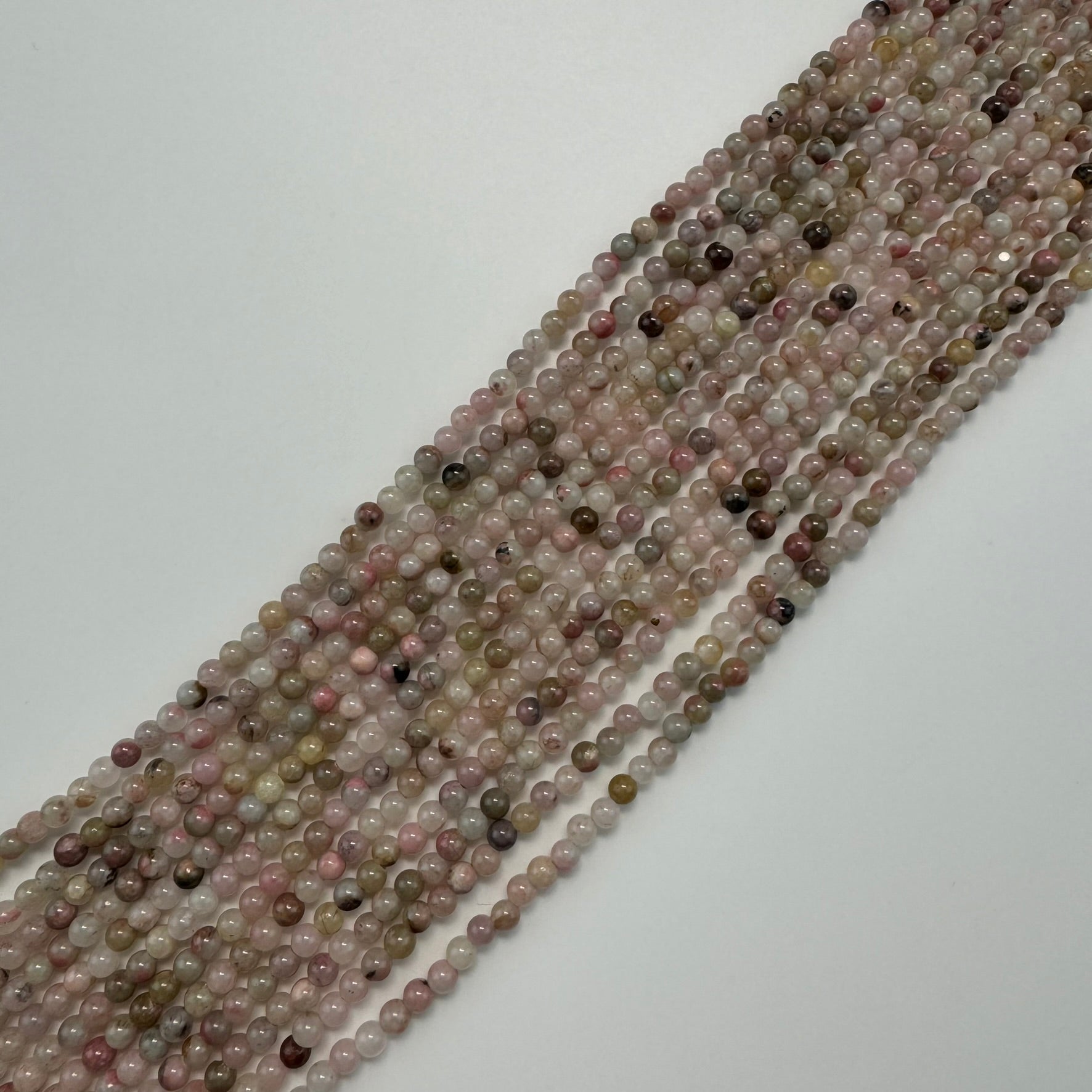 Sakura Rhodonite Polished Round Beads - Color B