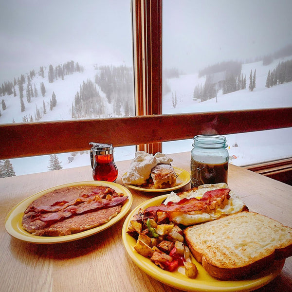 Breakfast plates at Bonnies Aspen overlooking the ski runs.