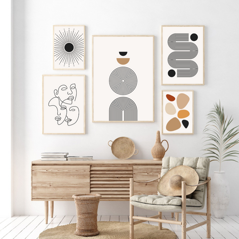 alt="five modern art prints in a modern living room"