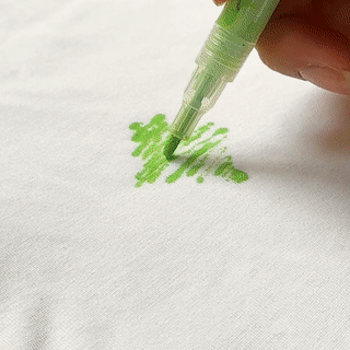 Step-by-step guide to creating a hand-painted T-shirt using acrylic markers, perfect for DIY beginners.