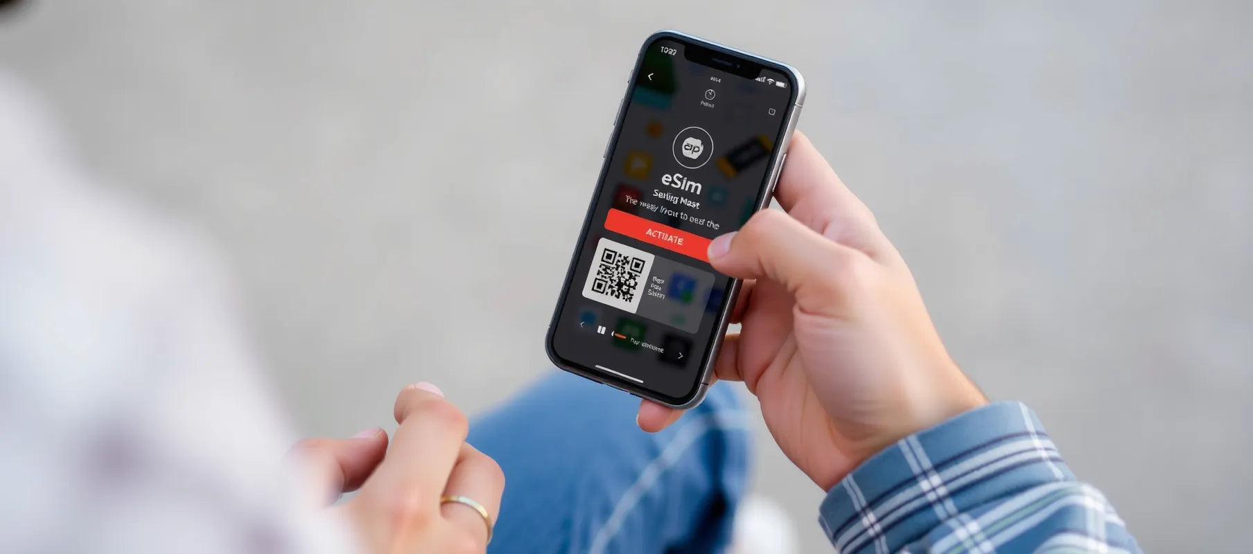 Person activating eSIM on smartphone with QR code, travel setting