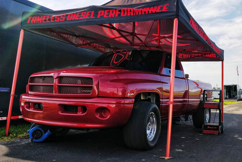 Red diesel racing truck from Tameless Performance diesel shop