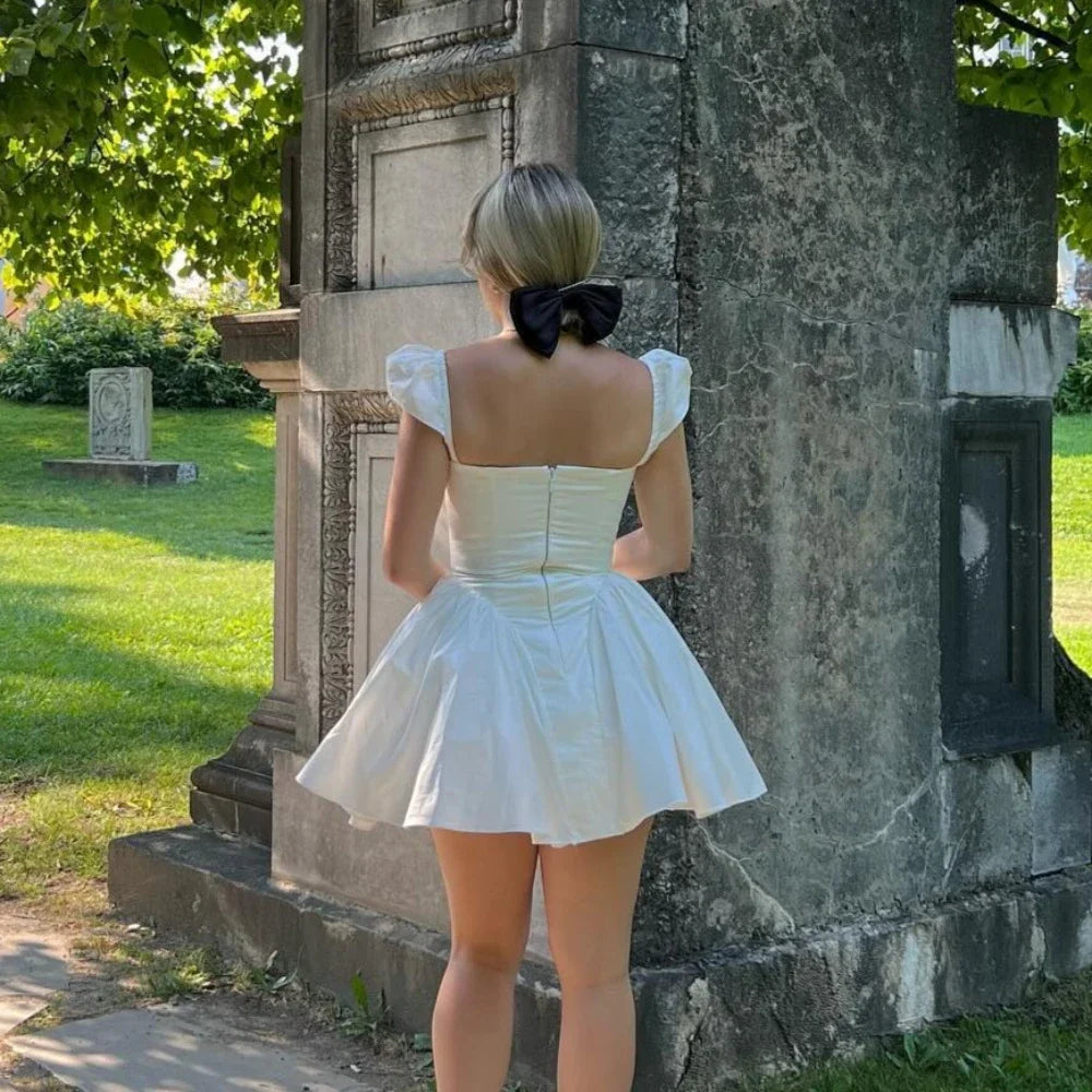 Elegant V-Neck Mini Dress with Cape Sleeves - Image 6
