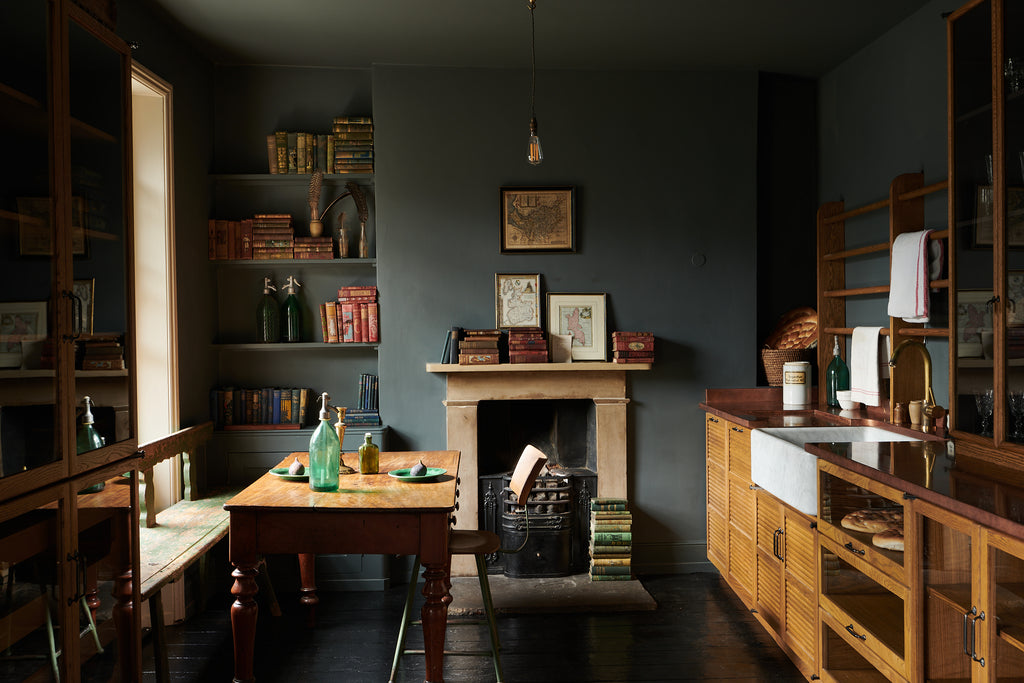 deVOL Kitchen dark and moody mid century mix with green paint and vintage pieces