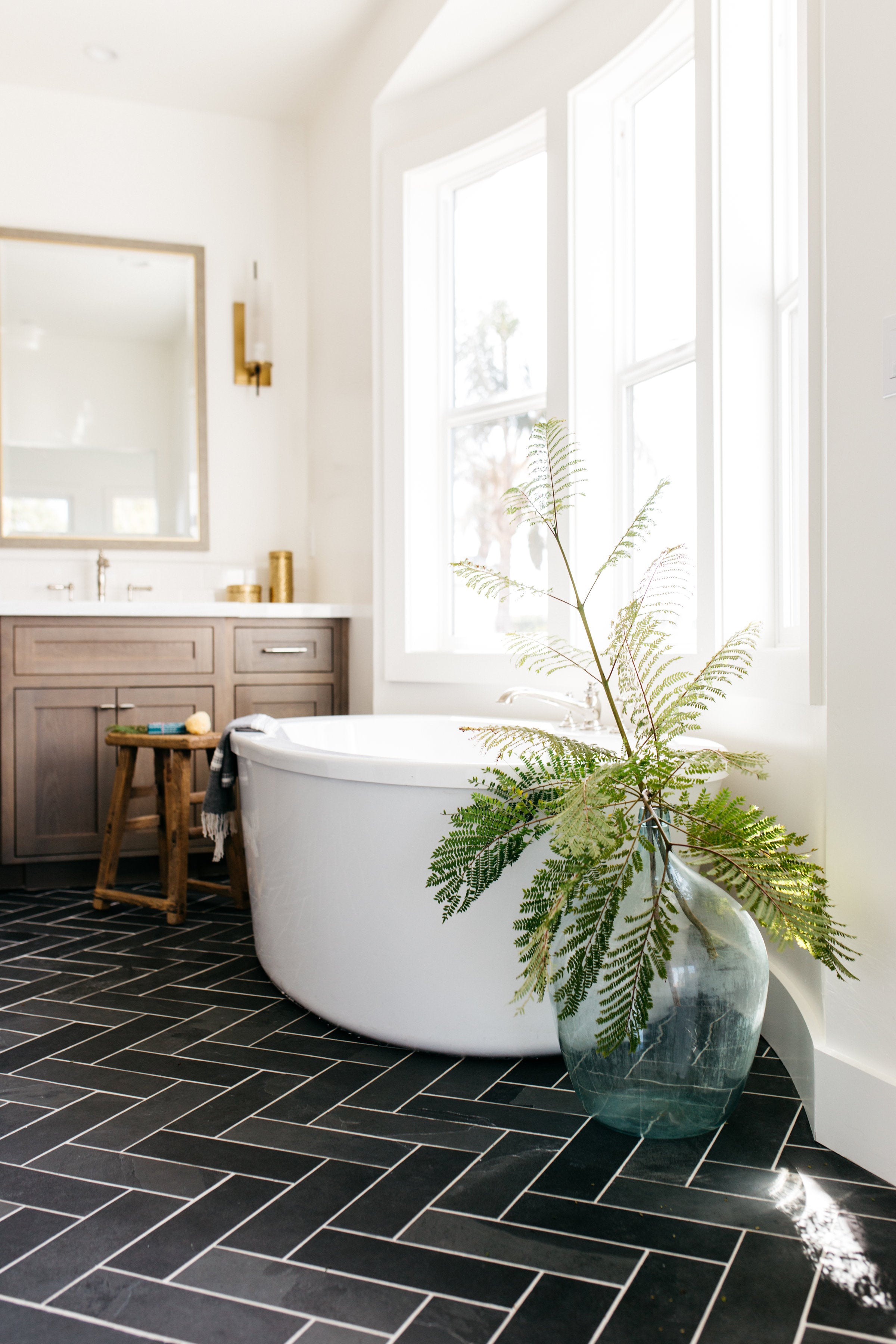 Devonshire greige design shop + interiors black and white bathroom herringbone slate tile