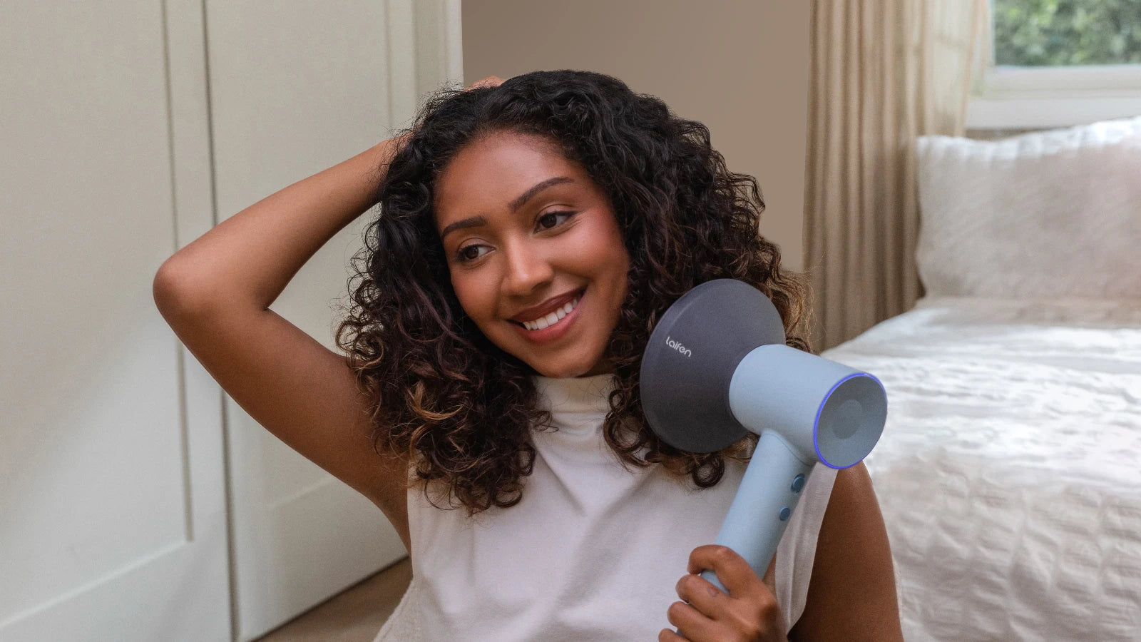 How do you get the perfect blowout with curly hair?