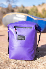 Purple dry bag for rafting.