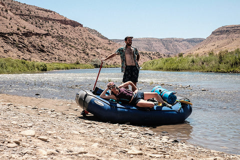 Rafting trip with river station gear throw bags. 