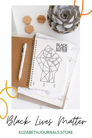 pinterest image_black lives matter mood tracker_blm mood tracker on open notebook with other stationery succulent and laptop