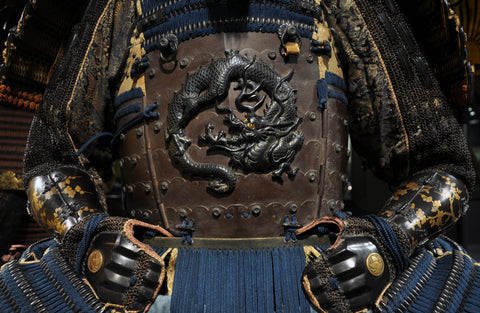 Samurai armor with a dragon symbol on the front