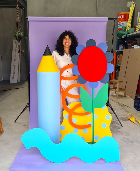 Craft-Based Designer Kitiya Palaskas with giant flower and bespoke props for Gorman
