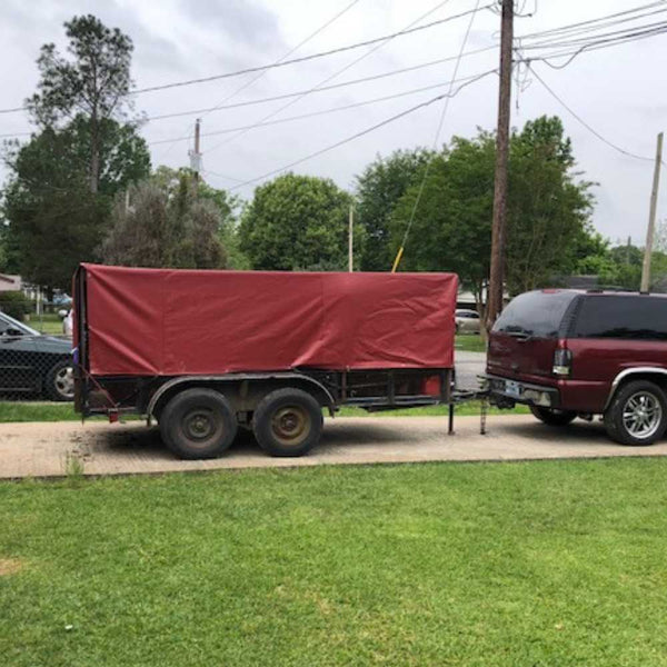 Custom 18 oz vinyl tarps used to cover a trailer