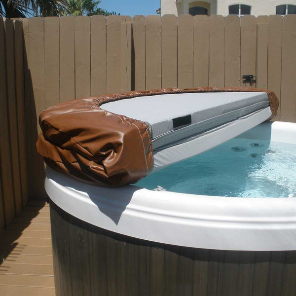 18 oz brown vinyl round cover with elastic corners used to cover a partially opened jacuzzi