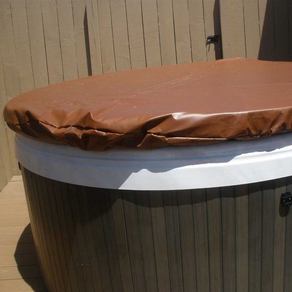 18 oz brown vinyl round cover with elastic corners used to cover a jacuzzi