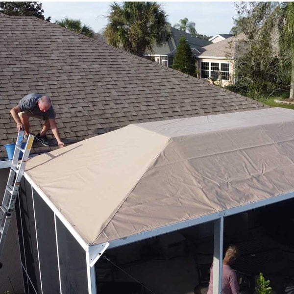 Custom shaped 18 oz tan vinyl tarp used as a roof cover