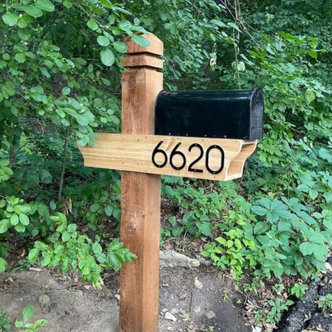a mailbox is the perfect place to put your house number sign