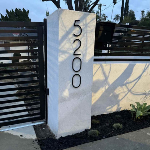 Place your house number sign right at the gate