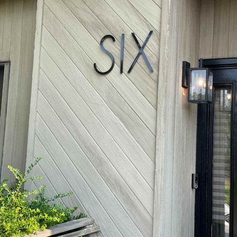 Spell out the Single number address with house letters for modern exterior style