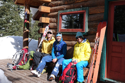 Greg Shaffran (AE ski guide), & team relaxing on the porch of the Friends Hut. 