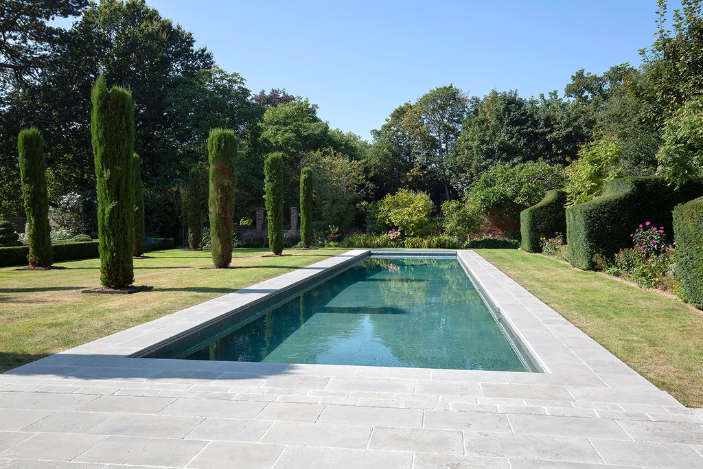 patio-flooring-ideas-clermont-gris-aged-tumbled-limestone-pool-tiles