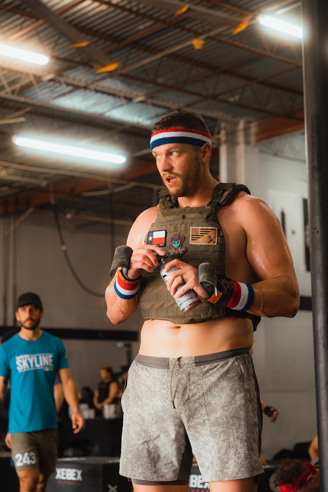 Men working out in an indoor setting