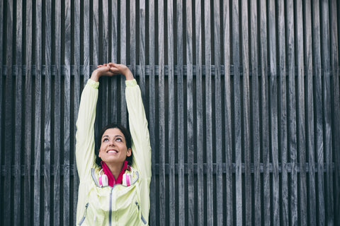 A woman doing forearm stretch