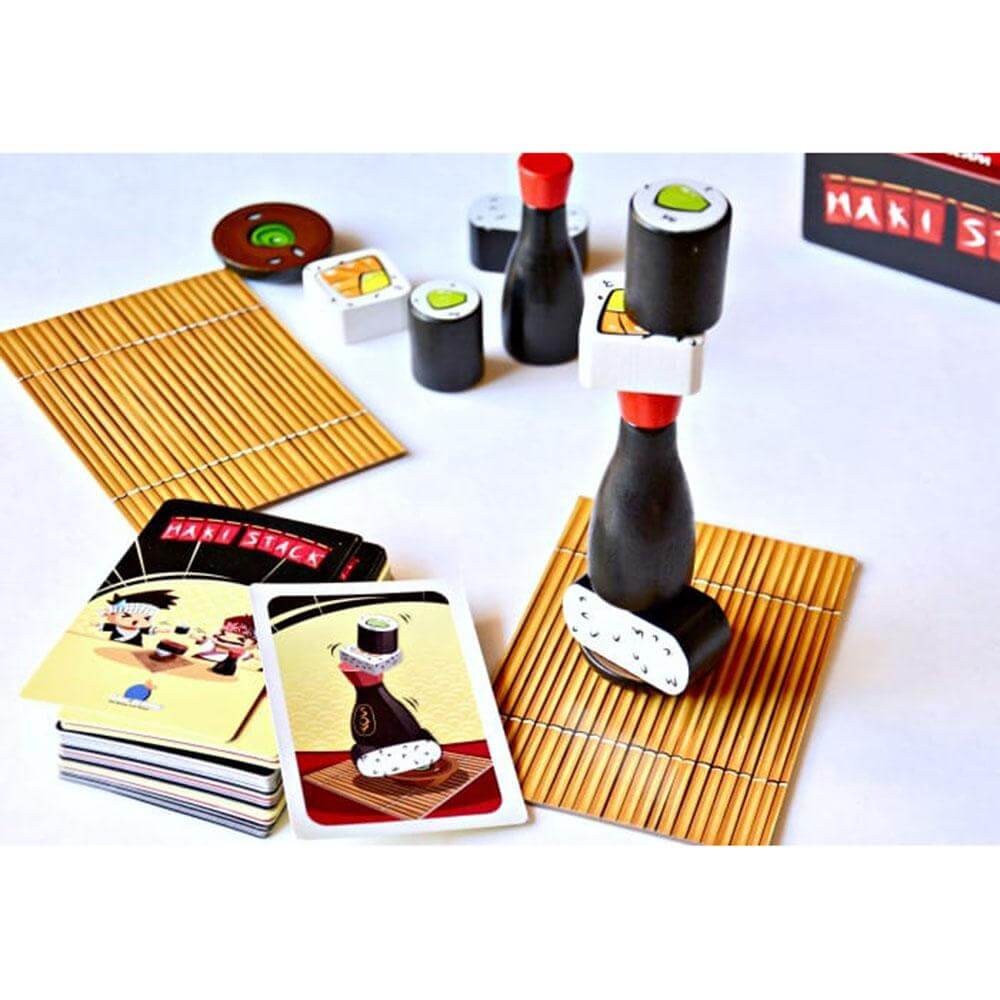 Sushi board game with sushi and soy sauce shaped pieces, cards, and mini sushi mats
