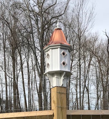 Copper Birdhouse Mounted on Fence Post
