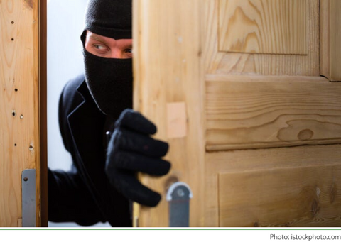 Robber entering door