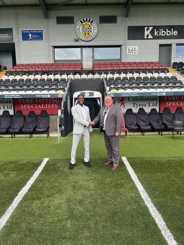 Founder, Adam Joji shaking hands with St Mirren Fc Commercial Manager, Campbell Kennedy