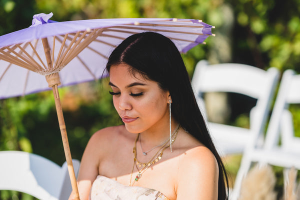 wedding guest with parasol