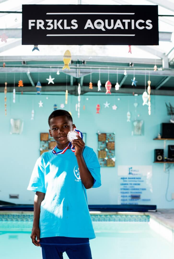 Children Holding Medals