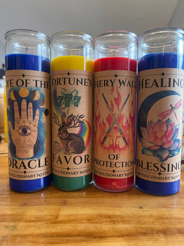 4 glass encased spell candles witch various colors and intentions