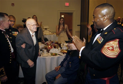 What is the Marine Corps Ball for older Marine veterans shown here attending the ball in the mid 2000s.?