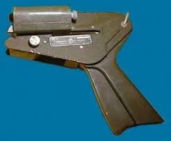 handheld gun-like tool called the Addressograph Model 70