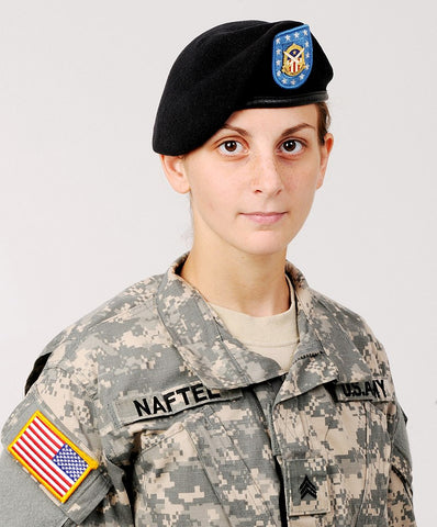 female soldier with black beret