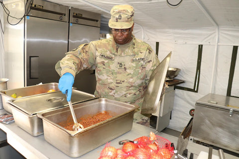 soldier stirring pot
