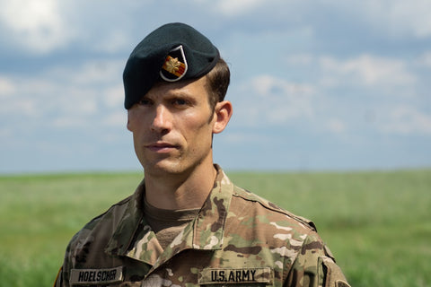 Army soldier wearing green beret