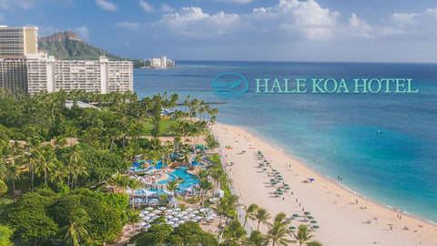 Hale Koa Hotel promotion picture with beach and people surfing