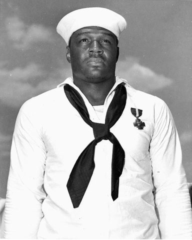 USN sailor Doris Miller a black American in uniform with navy cross pinned